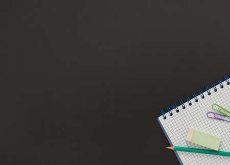 School supplies close-up on blackboardの写真素材