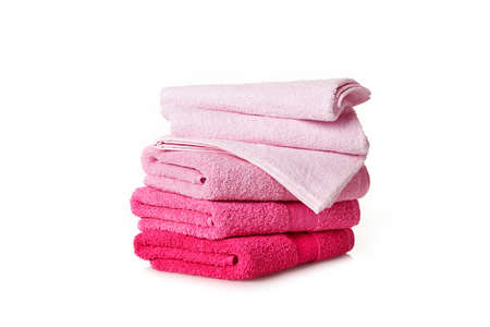 Soft pink towels on white backgroundの写真素材