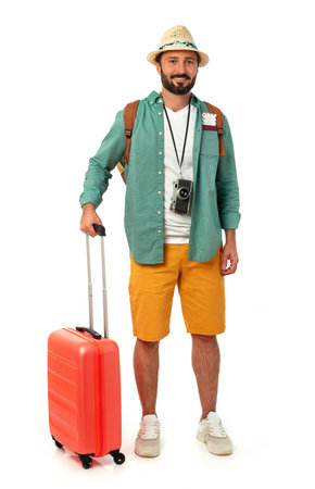 Cheerful man with suitcase on whiteの写真素材