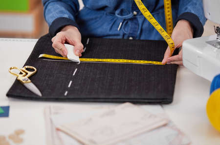 Woman dressmaker working on patternの写真素材