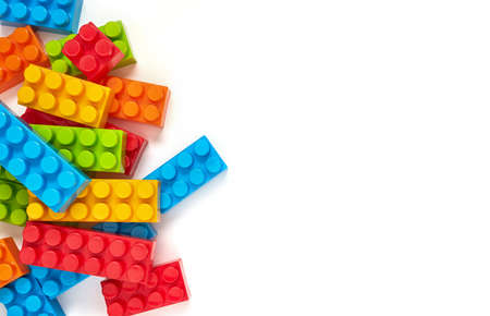 Plastic toy blocks on white background