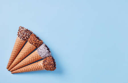 Ice cream cones on blue background
