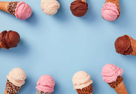 Ice cream cones frame on blue backgroundの写真素材
