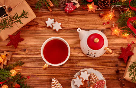 Christmas background with Christmas decoration and tea on woodの写真素材
