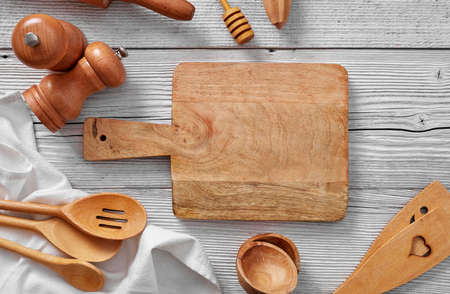 Cooking background: cutting board and kitchen utensilsの写真素材