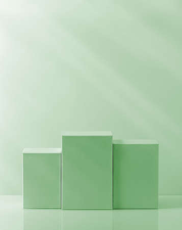 Empty pedestal, product stand on greenの写真素材