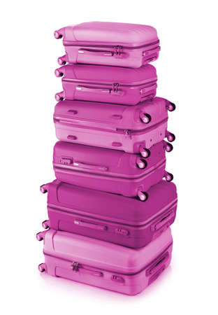 Pink luggage stack on whiteの写真素材