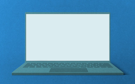 Paper cut laptop on blue backgroundの写真素材
