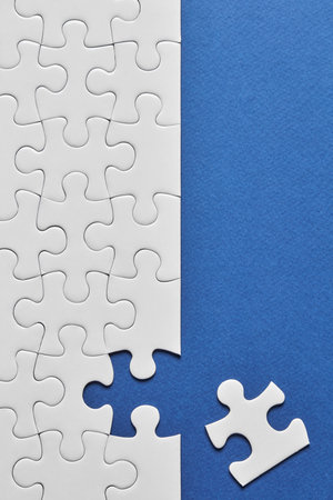 Puzzle jigsaw with a missing pieceの写真素材
