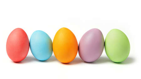 Multi-colored eggs on white backgroundの写真素材