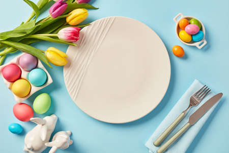 Colorful Easter Eggs and White Plate