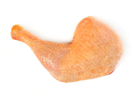 Farm chicken leg on white backgroundの写真素材