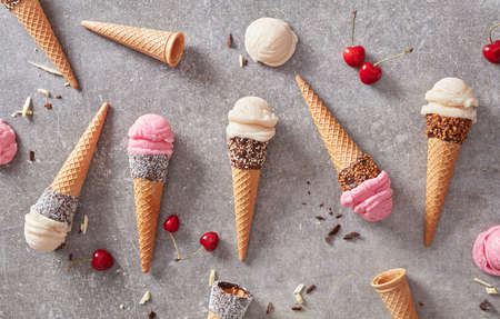 Vanilla and cheery ice cream cones