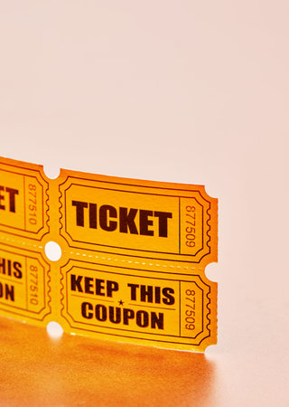 Golden raffle tickets, admission coupon roll with copy space