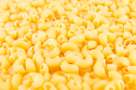 raw pasta on wood backgroundの写真素材