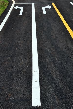 turn arrow traffic symbol on street surface
