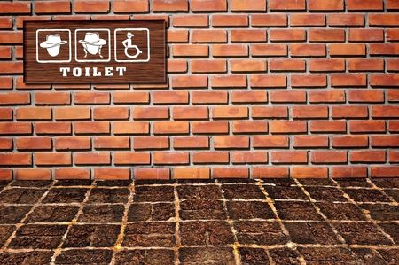 Toilet sing as brickwall patternの写真素材