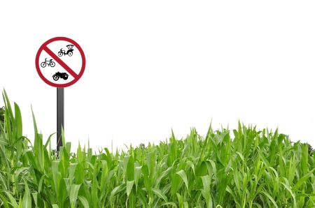 Traffic logo and green grassの写真素材