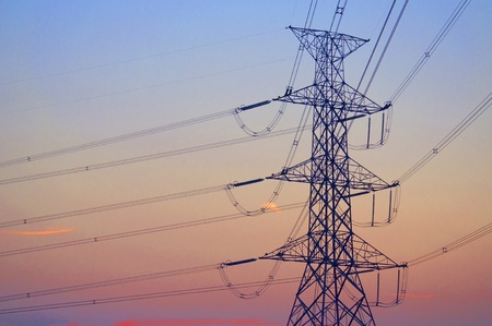 electric high voltage power post as twilight skyの写真素材