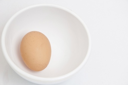 Egg in cup as isolate backgroundの写真素材
