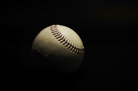 base ball in black color backgroundの写真素材