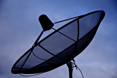 Satellite dish with blue skyの写真素材