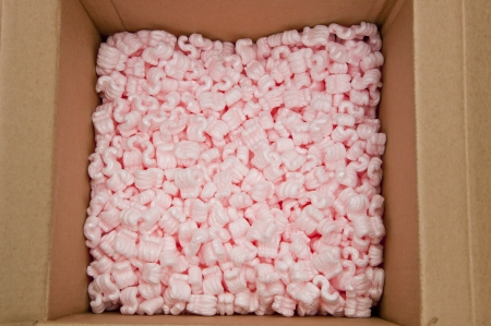 pink packing foam in paper boxesの写真素材