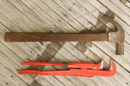 hammer and wrench as bamboo backgroundの写真素材