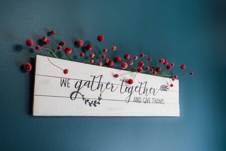 we gather together and give thanks sign on the wallの写真素材