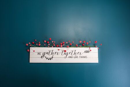 we gather together and give thanks sign on the wallの写真素材