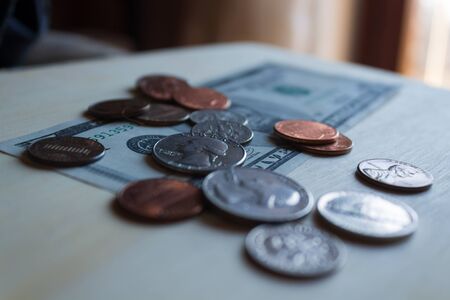Dollars Closeup Concept. American Dollars Cash Money. Five Dollar Banknote and coins.