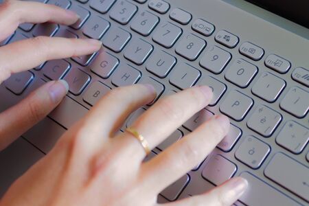 Woman Hands Typing Notebook Keyboardの写真素材