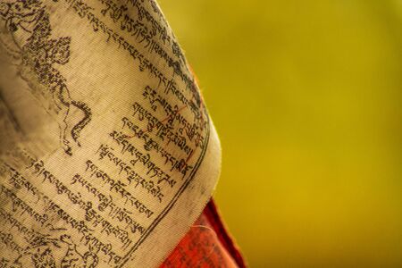 Portion of a prayer tibetan flag with copy spaceの写真素材