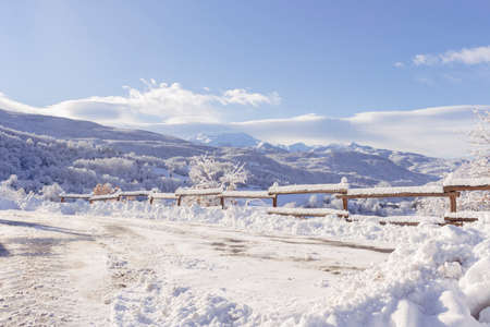 Landscape of Tuscan-Emilian Apennines in Ventasso, Italy. Snowcapped mountains and vegetation in winter. Copy space.の写真素材