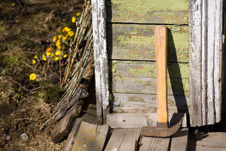 hammer near old wooden wallの写真素材