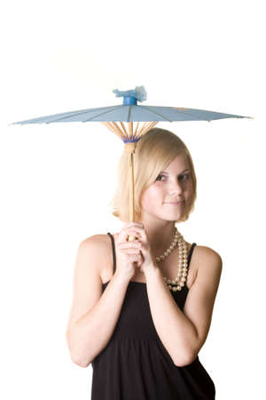 young blonde girl with orient umbrellaの写真素材