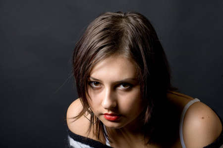 teen girl low-key studio shotの写真素材