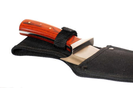 hunting knife in case isolated on whiteの写真素材