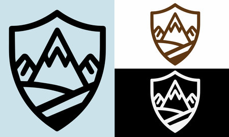 Shield with mountains in the form of a shield. Vector illustration.のイラスト素材