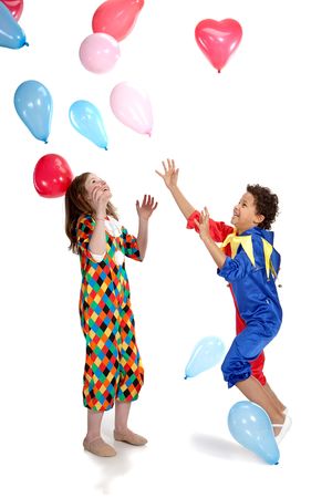interracial  children in clown costums playind togetherの写真素材