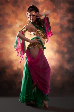 Beautiful exotic belly dancer woman の写真素材