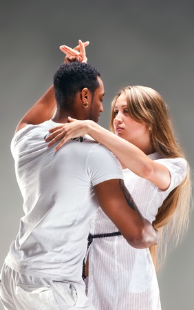 Young couple dances Caribbean Salsaの写真素材