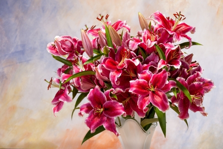 Bouquet of pink lilies on a colored backgroundの写真素材