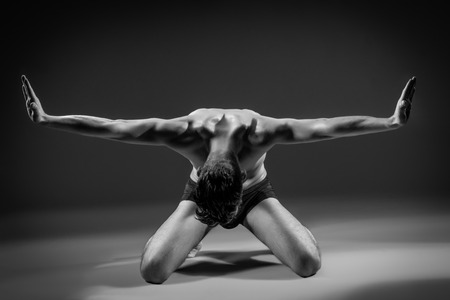 Beautiful and health athletic muscular young man.の写真素材