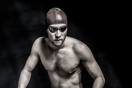 Studio shot of a handsome swimmerの写真素材