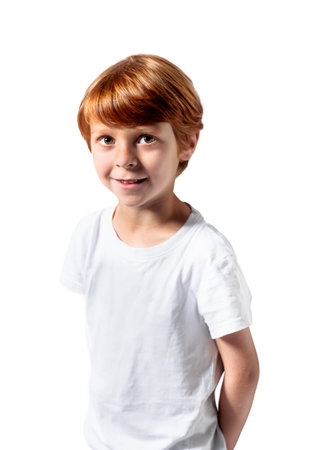 Red-haired boy in white t-shirt close-up cropped view at gray backgroundの写真素材