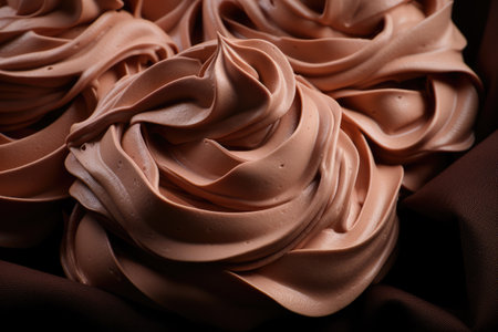 Chocolate curls of cream closeup, swirl of hazelnut pasteの写真素材