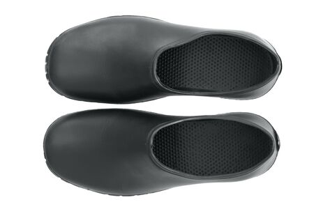 Rubbers galoshes isolated on white background. Weather sealing accessory for shoes. Retro cases for protection shoes from dirt.の写真素材
