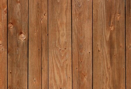 Natural wooden planks background colored in orange or brown colorの写真素材
