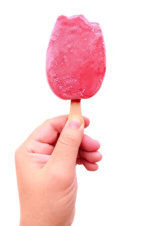 Men hand take pink ice cream on wooden stickの写真素材